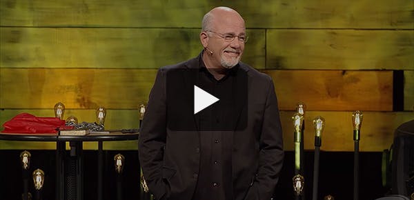 Dave Ramsey smiling genuinely on stage